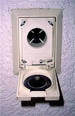 Contactdoos van een centraal stofzuigersysteem.