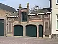 Koetshuis in Invloed art nouveau stijl