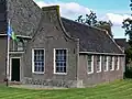 Dorpsschoolgebouw, bijgebouw van de Nederlands-hervormde kerk