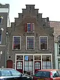 Pand met eenvoudige trapgevel, gedateerd in jaartalankers: 1680